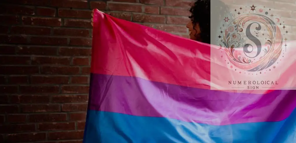 Dona amb una bandera bisexual